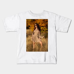 Autumnal portrait of a beautiful woman outdoors Kids T-Shirt